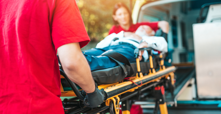 paramedics with patient on stretcher